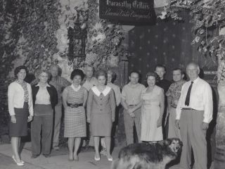 Bartholomews and team in front of restored Cellars